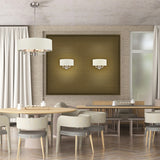 Windsor 2 light wall light in satin nickel finish, shown in a room setting