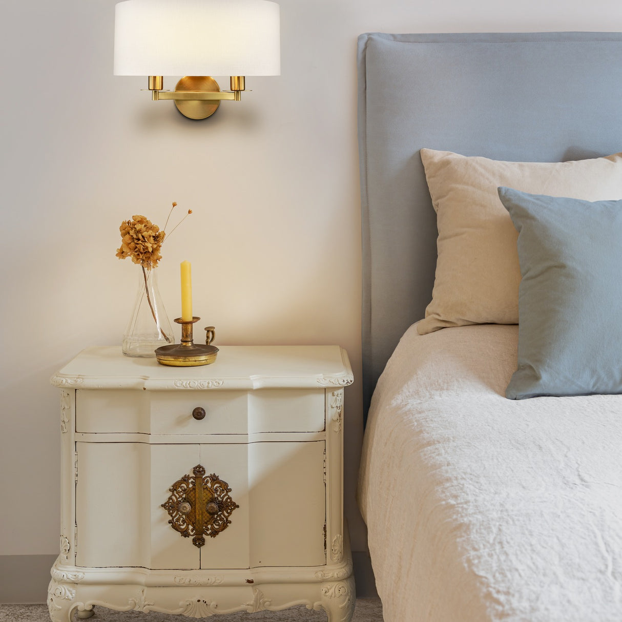 Windsor 2 light wall light in brass finish, shown in a room setting