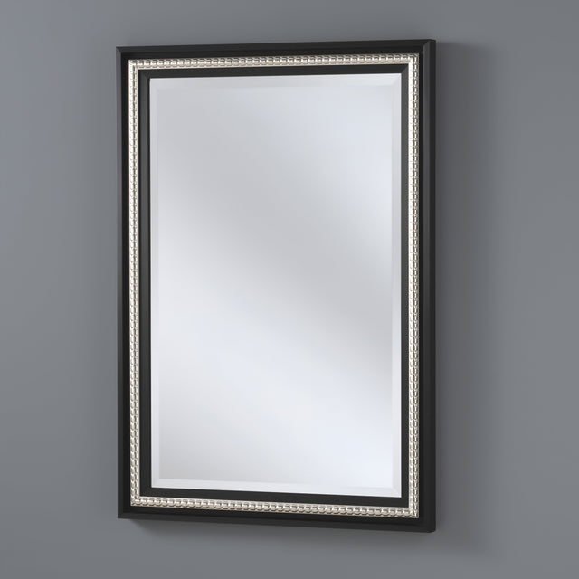 Rectangular wall mirror framed with a textured dark grey border, placed against a patterned wallpaper, blending a modern industrial design with subtle elegance.