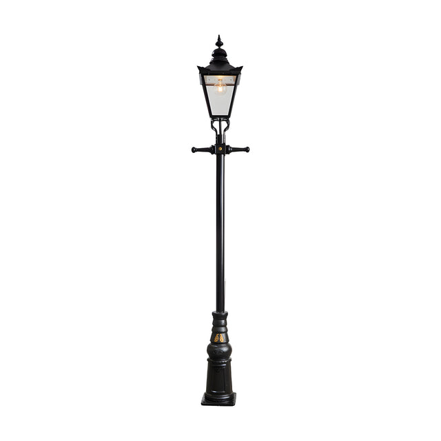 Victorian-style black cast iron lamp post, 3.3m tall, featuring a tapered lantern head, cast finial, decorative scroll brackets and a stepped moulded base.