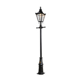Victorian-style black cast iron lamp post, 3.3m tall, with a tapered four-sided lantern head, stepped crown, corner tips, cast finial, and decorative base, shown on a plain white background.