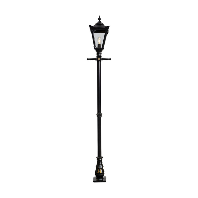 Black Victorian cast iron lamp post, 2.6m tall, with a four-sided glass lantern head, decorative crown finial and ornate cast base, shown on a plain white background.