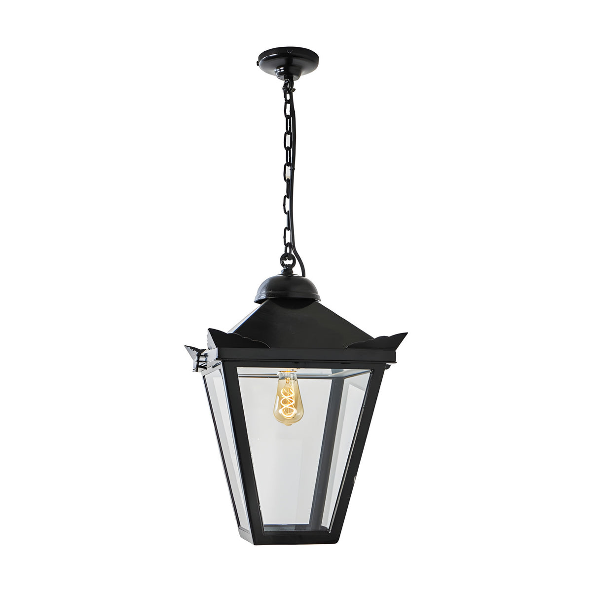 Large Victorian cast iron hanging lantern in black, tapered four-sided head with stepped crown and corner tips, suspended on a chain with ceiling rose, on a plain white background.