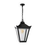 Large Victorian cast iron hanging lantern in black, tapered four-sided head with stepped crown and corner tips, suspended on a chain with ceiling rose, on a plain white background.
