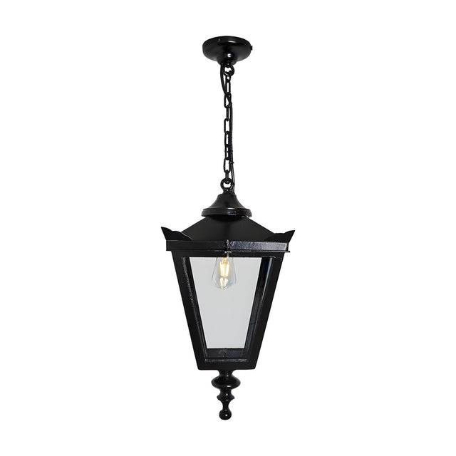 Medium Victorian cast iron hanging lantern in black, tapered four-sided glass head with stepped crown and finial, suspended from a chain, on a plain white background.