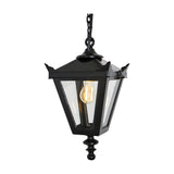 Small Victorian cast iron hanging lantern in black with tapered four-sided glass panels, stepped crown, corner tips, cast finial and hanging chain, shown on a plain white background.