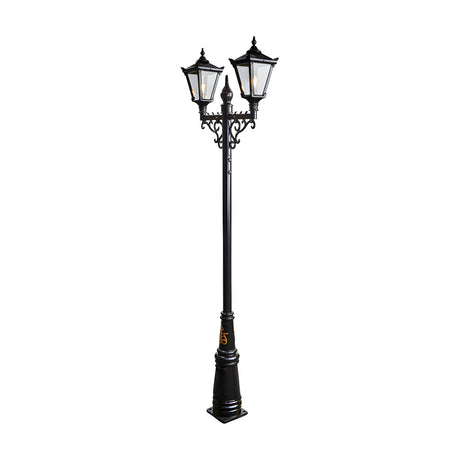 Victorian cast iron double-headed lamp post in black, 3.3m tall with two tapered lantern heads, glass panels and scrolled cross-arm bracket, on a plain white background.