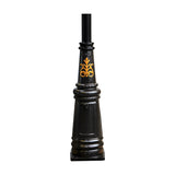 Victorian cast iron lamp post base in black with tapered fluted body, gold scroll motif, ribbed banding and square plinth, plain white background.