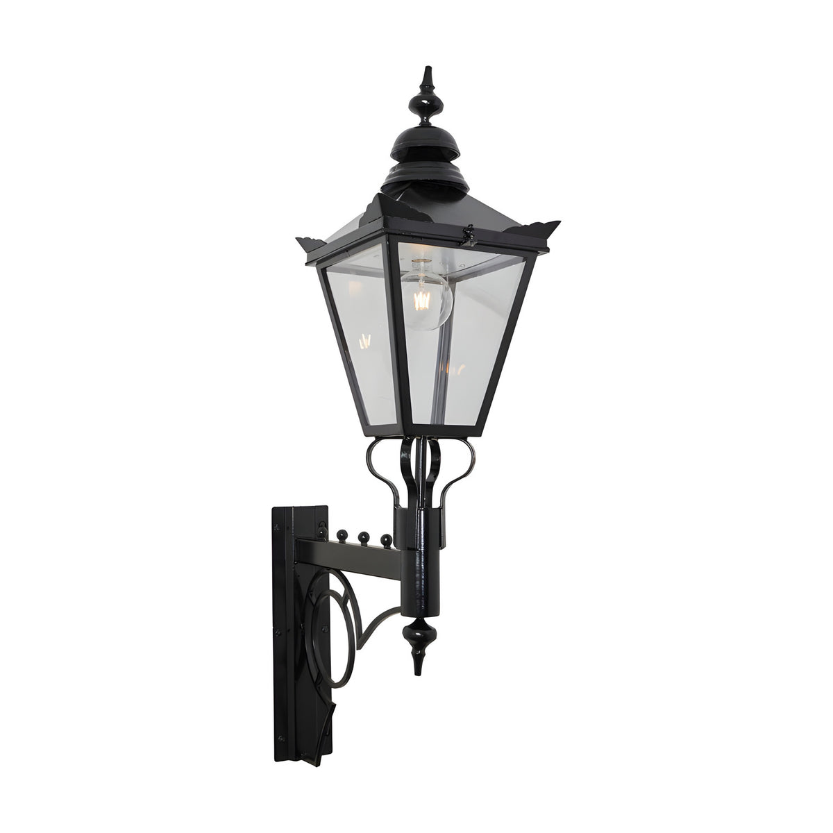 Large Victorian wall lantern in black, tapered four-sided glass head with stepped crown and finial, mounted on a scroll bracket, E27 bulb visible, plain white background.