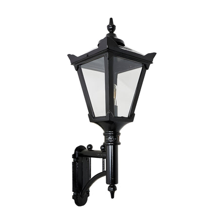 Victorian cast iron wall lantern in black with a tapered glass panel head, stepped crown, cast finial, and short mounting arm, shown on a plain white background.