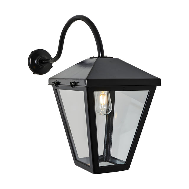 Contemporary Barn Wall Lantern in black steel with glass panels, curved wall bracket arm, tapered lantern shade and E27 bulb, IP44 rated, shown on a plain white background.