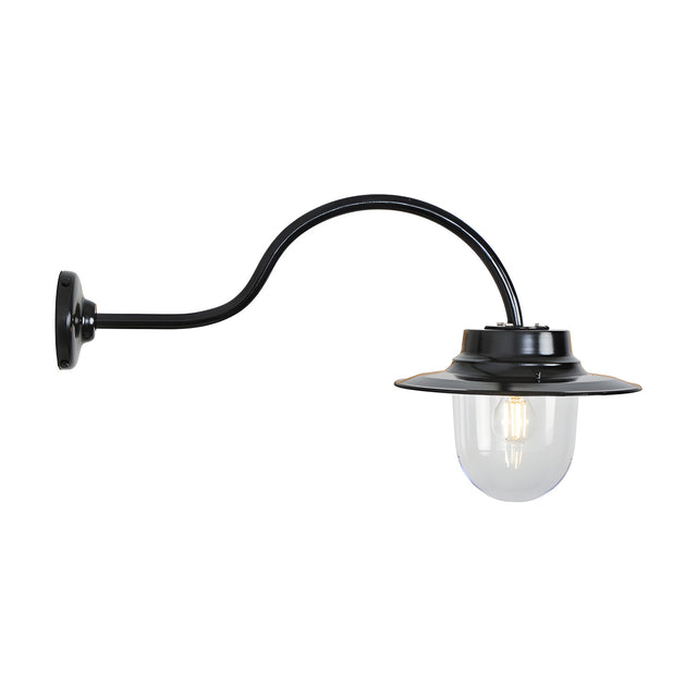 Contemporary black outdoor wall lantern on a curved goose neck bracket with a clear glass dome shade and flat top, shown lit against a plain white background.