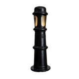 Large Victorian cast iron bollard light in black, stepped and beaded column with frosted polycarbonate lens panels, mounted on a round base plate against a plain white background.