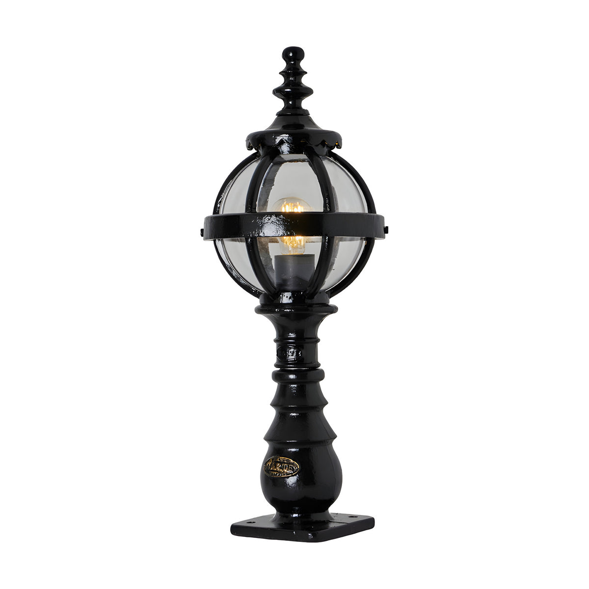 Small Victorian cast iron globe pedestal post light in black, single-light fixture with clear glass globe in a banded cage on a decorative base, shown on a plain white background.