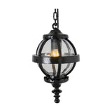 Small Victorian Globe Hanging Lantern in black, a cast iron banded cage with clear globe shade and chain suspension, shown lit against a plain white background.