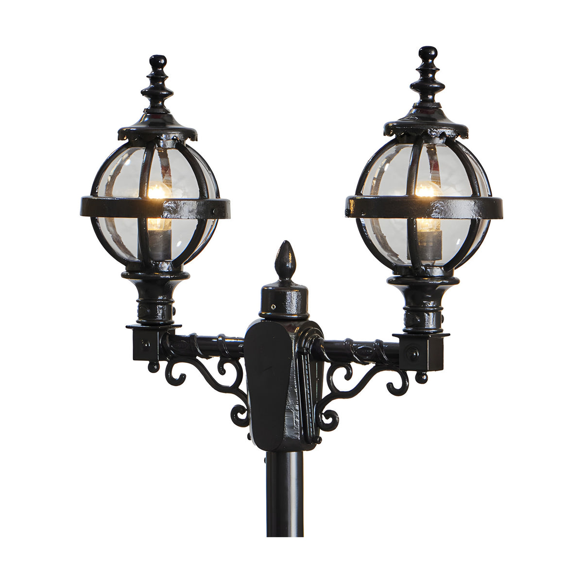 Victorian double-headed lamp post in black cast iron with two globe lanterns in banded cages, decorative scrollwork brackets and finials, shown against a plain white background.