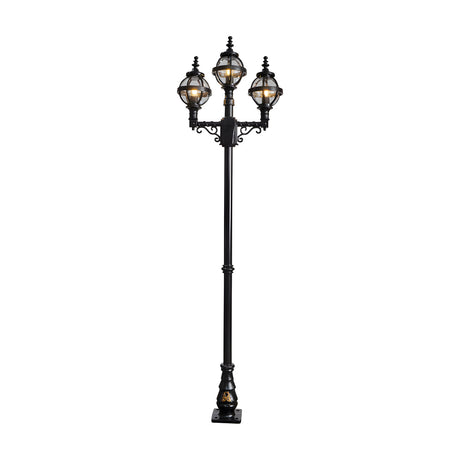 Victorian-style triple-headed lamp post in black cast iron, 2.6m tall, with three globe lanterns in banded cages atop a scrolled crossarm and fluted base, shown on a plain white background.