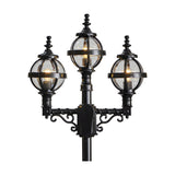 Victorian-style black cast iron triple-headed lamp post with three globe lanterns in banded cages atop a central pole, shown against a plain white background.