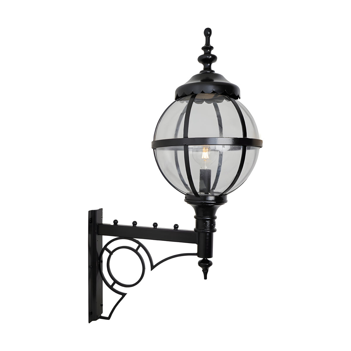 Large Victorian Globe Wall Lantern in black, a clear glass globe held in a banded iron cage on a decorative scroll bracket, shown on a plain white background.