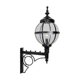 Large Victorian Globe Wall Lantern in black, a clear glass globe held in a banded iron cage on a decorative scroll bracket, shown on a plain white background.