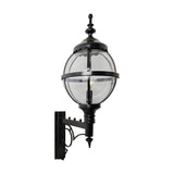 Large Victorian globe wall lantern in black, clear glass globe held in a banded iron cage, mounted on a scroll bracket, shown on a plain white background.