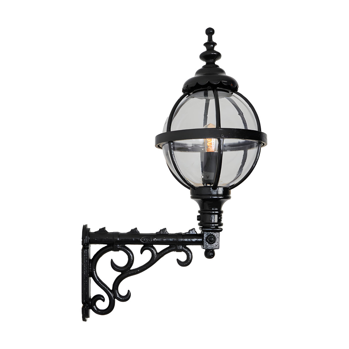 Medium Victorian globe wall lantern in black with a caged glass sphere on an ornate scroll bracket, shown on a plain white background.