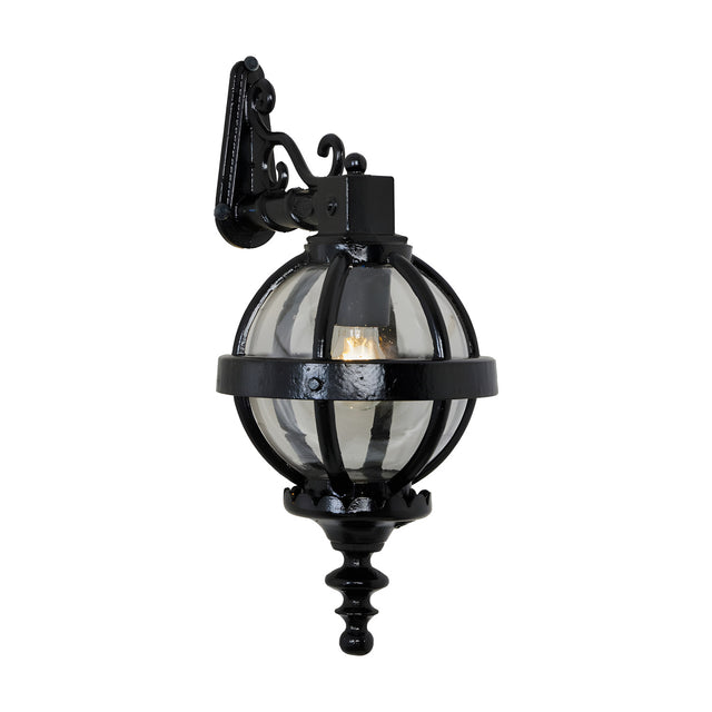 Small Victorian cast iron downturned globe wall lantern in black, with a banded cage design, ornate mounting bracket, and finial base, shown on a plain white background.