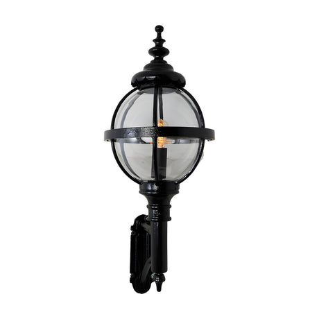 Victorian cast iron globe wall lantern in black, with clear polycarbonate glazing in a banded cage, mounted on a short arm, shown against a plain white background.