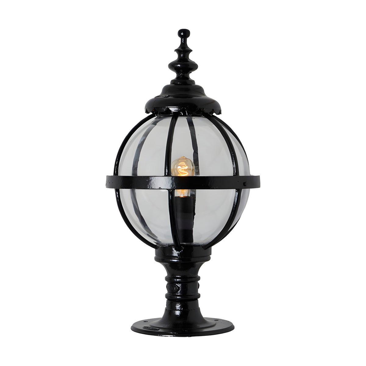 Medium Victorian Globe Pillar Light in black with a clear glass globe held by a banded iron cage on a turned pedestal base, lit E27 bulb visible, shown on a plain white background.