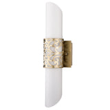 The Venera 2 Light Wall Light features a vertical white frosted tubular glass with an ornate gold band, mounted on a brass base. It adds sophistication and ambient lighting to any space.