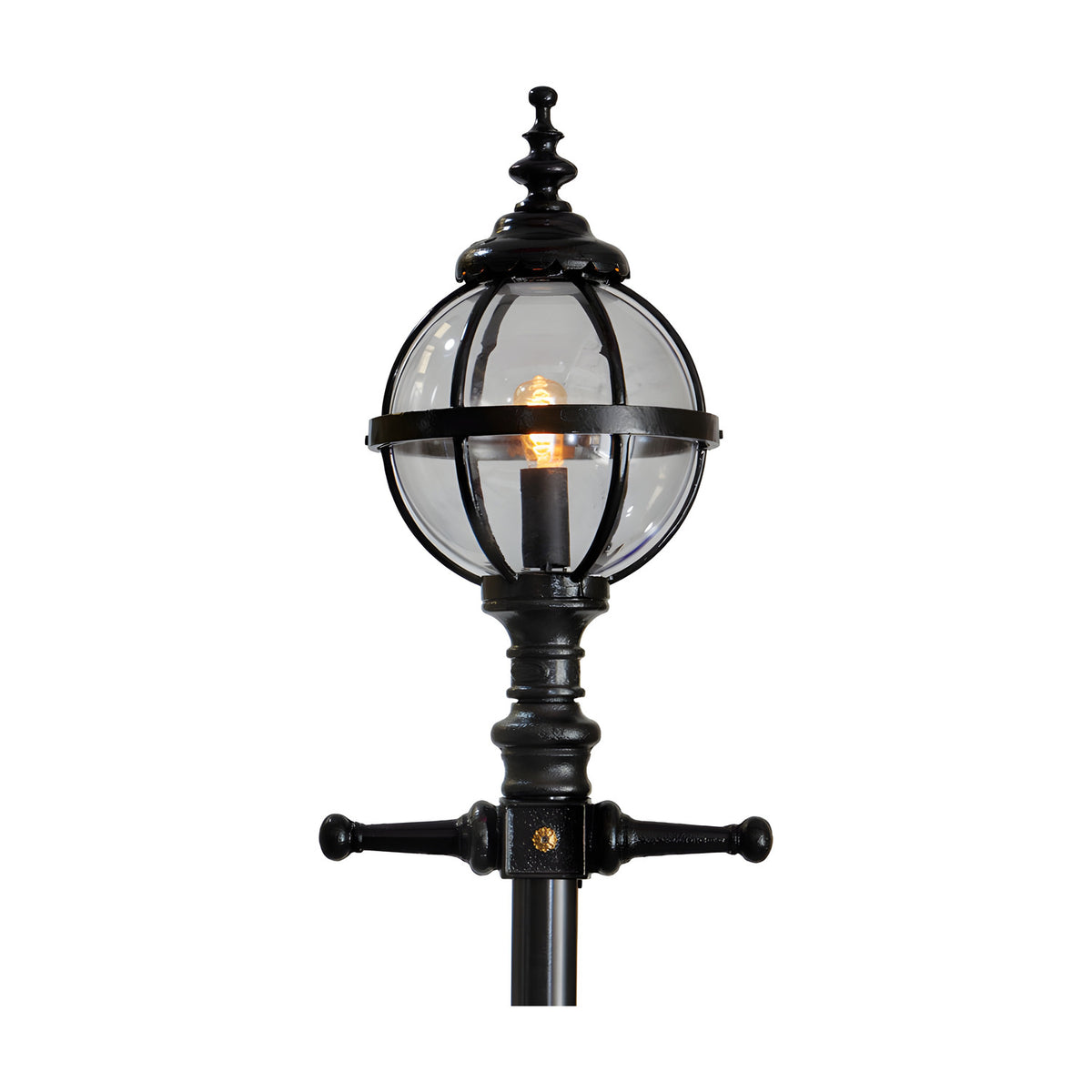 Victorian Manor cast iron globe lamp post in black, close-up of the banded glass globe with lit bulb and ornate finial atop the post, shown on a plain white background.