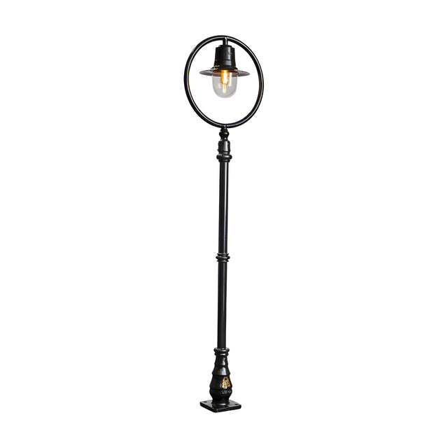 Railway Style Cast Iron Lamp Post, 2.43m tall in black, with a single spun shade under a circular hoop over a clear polycarbonate dome, set on a decorative iron base against a plain white background.