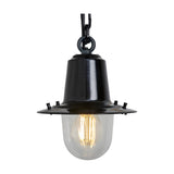 Small railway-style hanging lantern in black, with a cast metal hoop, wide angled shade, and clear domed glass cover, hung on a black chain against a plain white background.