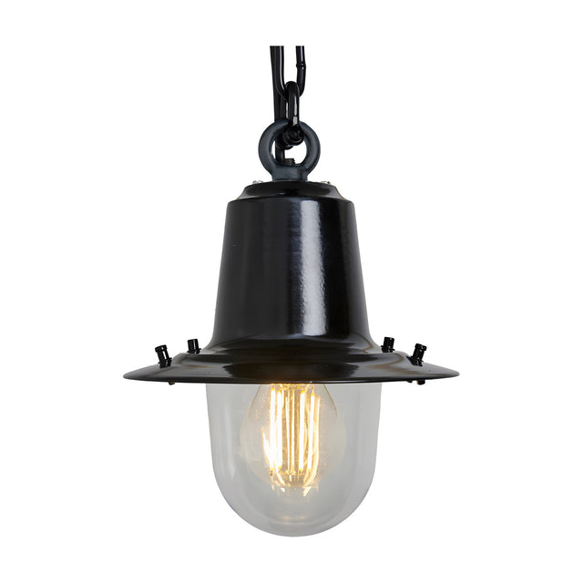 Small railway-style hanging lantern in black, with a cast metal hoop, wide angled shade, and clear domed glass cover, hung on a black chain against a plain white background.