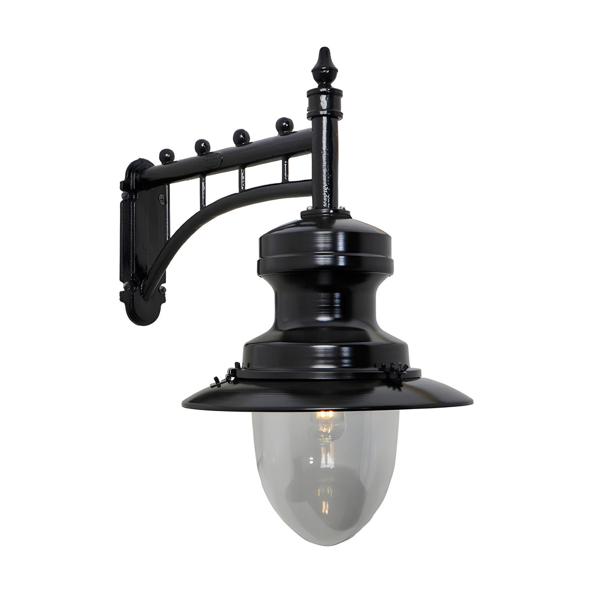 Large railway style outdoor wall lantern in black, with a trussed cast arm, spun metal shade and clear glass dome, shown on a plain white background.