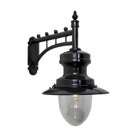 Large railway style outdoor wall lantern in black, with a trussed cast arm, spun metal shade and clear glass dome, shown on a plain white background.