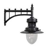 Large railway style wall lantern in black, with a trussed cast arm bracket, spun metal shade, and clear glass dome, shown on a plain white background.
