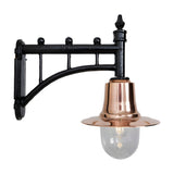 Medium railway style wall lantern with a black trussed cast iron arm, copper spun shade, and clear glass dome, shown on a plain white background.