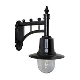 Medium Railway Style Wall Lantern in black on a decorative cast arm bracket with spun metal shade and clear glass dome, shown against a plain white background.