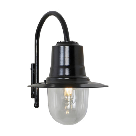 Small vintage wall lantern in black with a curved goose neck bracket, teardrop shade, and clear polycarbonate cylinder housing an exposed bulb, shown on a plain white background.