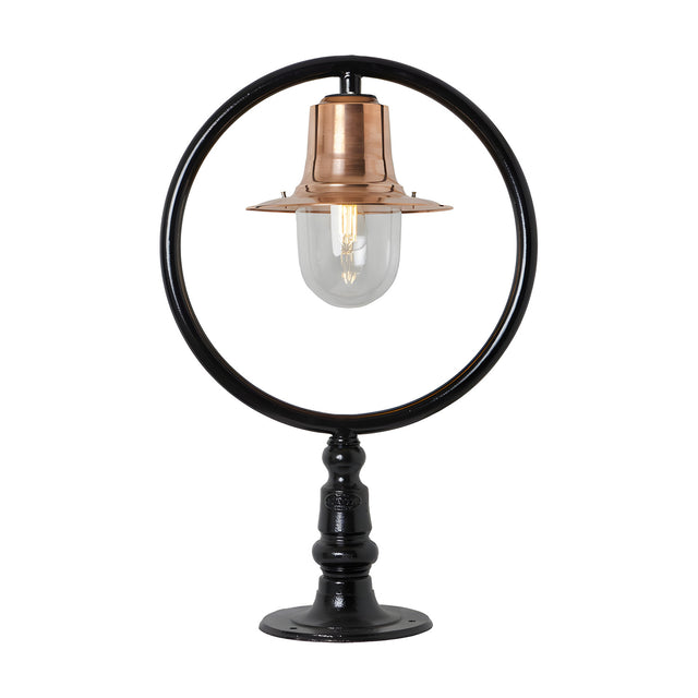 Large Railway Style Pillar Light for flat piers, black metal hoop frame with copper spun shade over a clear glass dome, mounted on a black pillar base, plain white background.