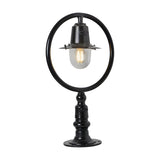 Small Railway Style Cast Iron Pillar Light in black, with a circular hoop frame over a spun shade and clear glass dome, mounted on a flat pier base, shown on a plain white background.