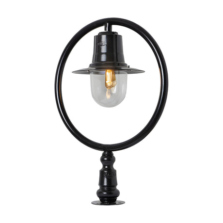 Black Railway Style Pillar Light for narrow piers, featuring a hoop frame, spun shade, and clear glass dome over a bulb, mounted on a pier cap base.