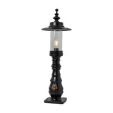 Large Georgian cast iron pedestal post light in black with clear glass shade, decorative crown top, ornate column detail, and square base plate on a plain white background.