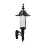 Large Georgian cast iron wall lantern in black with a clear cylindrical glass panel, wide crown top, and decorative wall bracket, shown on a plain white background.