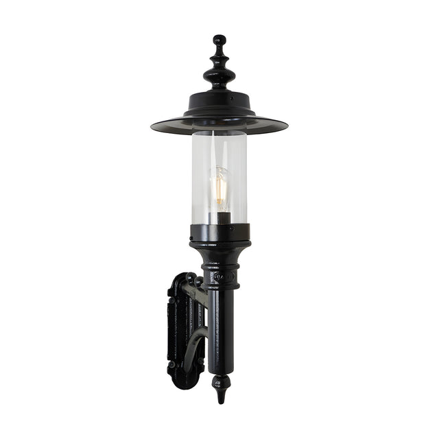 Medium Georgian Cast Iron Wall Lantern in black, single-light outdoor fixture with clear glass cylinder, exposed bulb, wide flat top shade and cast bracket arm, shown on a plain white background.