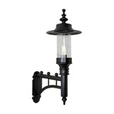 Medium Georgian Cast Iron Wall Lantern in black with a scrolled bracket, cylindrical clear glass shade, and pointed finial, shown against a plain white background.