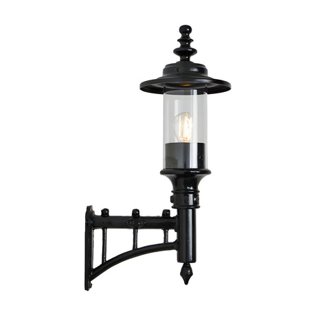 Small Georgian cast iron outdoor wall lantern in black, single-light with clear cylindrical glass shade and decorative wall bracket, shown on a plain white background.