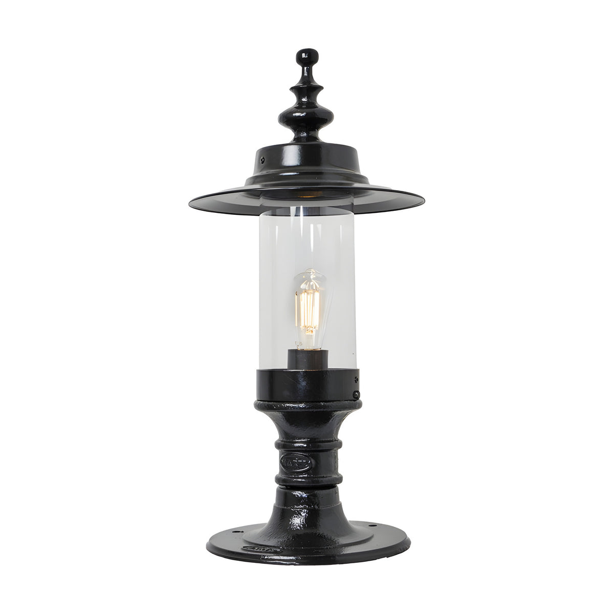 Large Georgian cast iron pillar light in black with a shallow crown-shaped hood, clear cylindrical glass shade, and flat pier cap base, shown on a white background.
