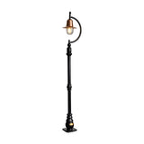 Traditional 1.5m cast iron lamp post with curved gooseneck arm, copper teardrop shade, clear glass dome, and black metal pole on square base, shown against a plain white background.